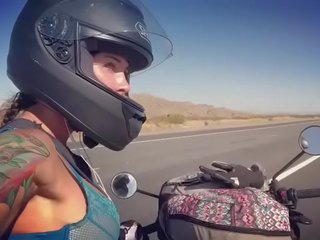 Felicity feline motorcycle enchantress riding aprilia in bra